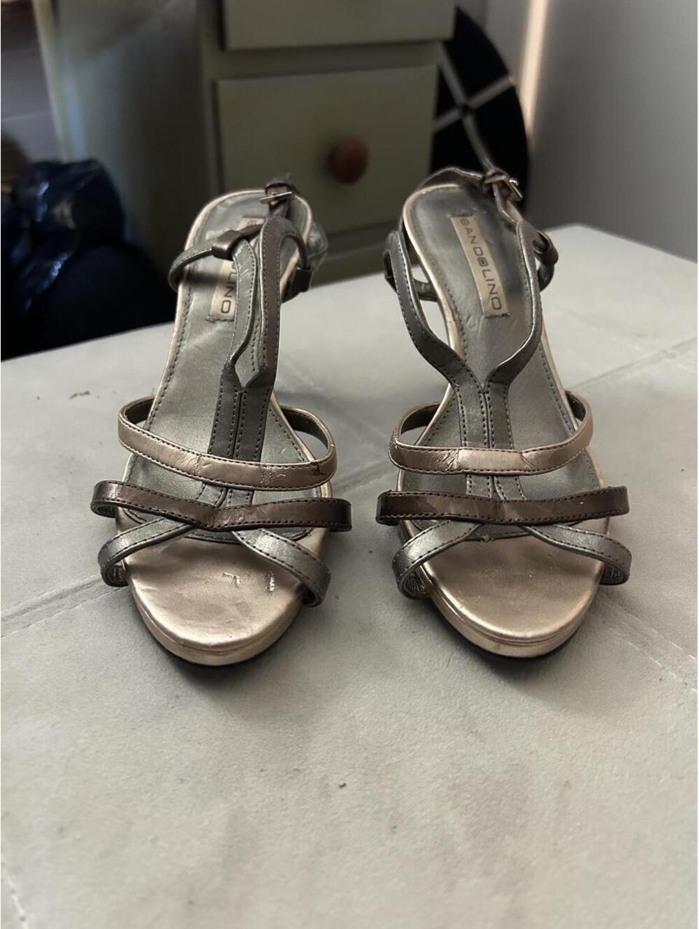 Bandolino silver metallic strappy 3 1/2”heels size 5.5